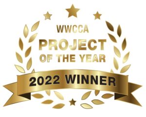 A gold wreath with the words wwcca project of the year 2 0 2 2 winner.