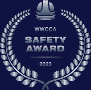 A silver wreath with the words wwcca safety award 2 0 2 3