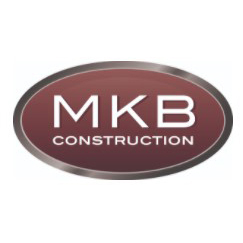 A red oval with the word mkb construction written in it.